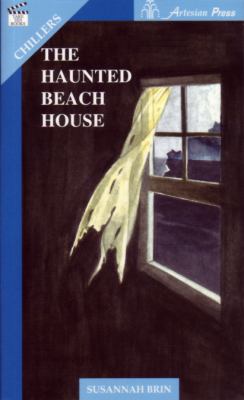 The haunted beach house cover image