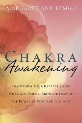 Chakra awakening : transform your reality using crystals, color, aromatherapy & the power of positive thought  cover image cdn