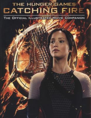 The Hunger games: Catching fire : the official illustrated movie companion  cover image cdn