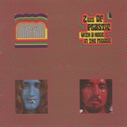 2 ozs. of plastic with a hole in the middle cover image cdn