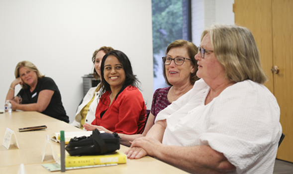 Attendees discuss book at Page Turners book discussion
