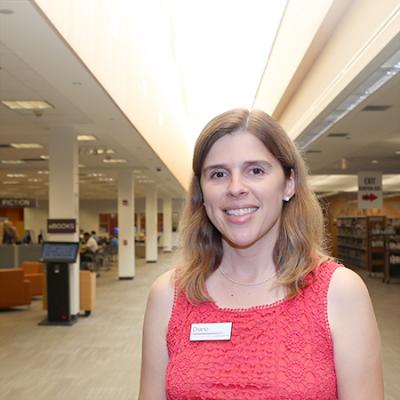Photo of Business Specialist Diane Malik in Library