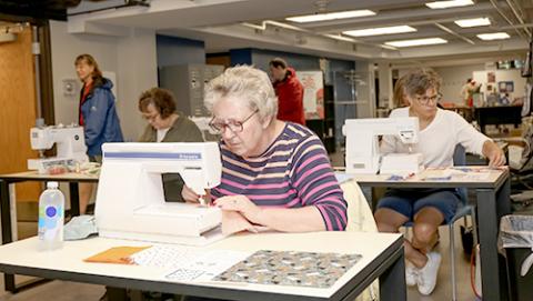 Makers sewing at machines